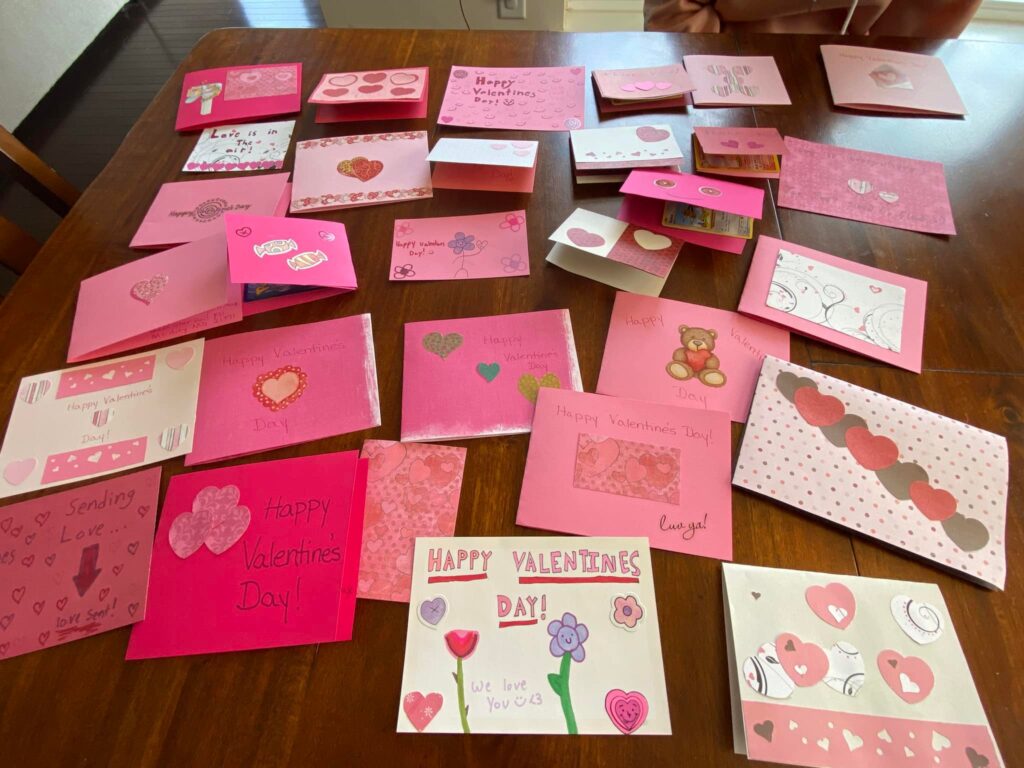 Junior member Charlotte Grimes, her brother Ben, their mother Jenn Hansen-grimes and ALA member Anna Grimes made 31 Valentine cards for Veterans at Martinsburg VA.